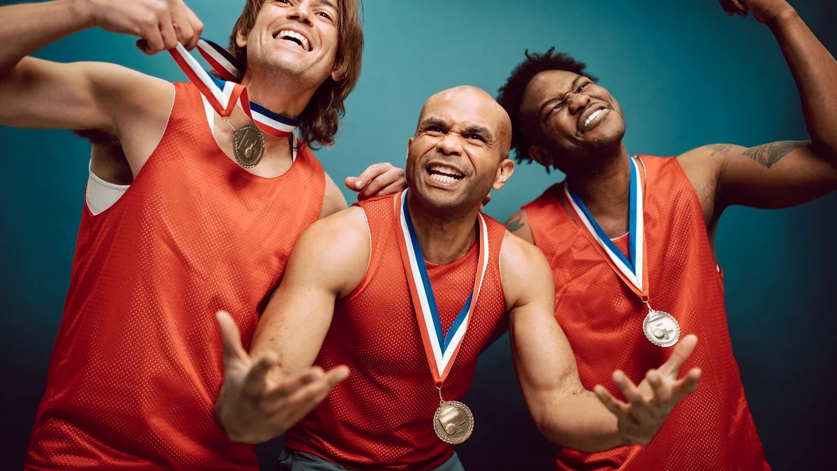 Illustrative team of athletes celebrating together with medals